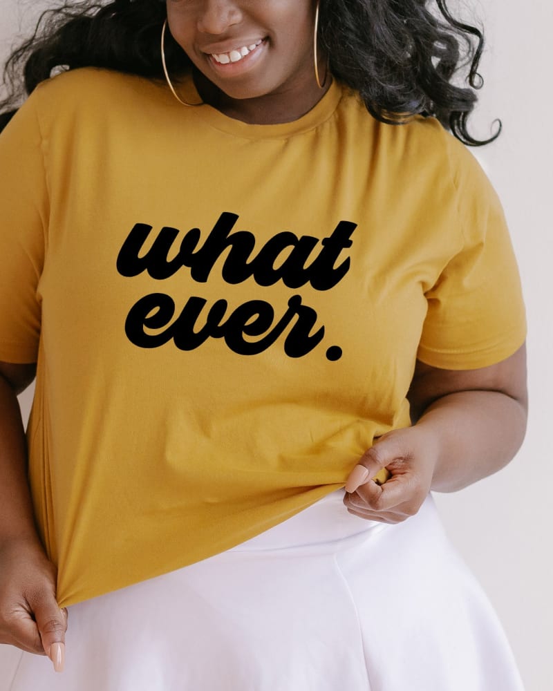 Front of a model wearing a size XL What Ever Cursive in Mustard by Simply Sage Market. | dia_product_style_image_id:281784